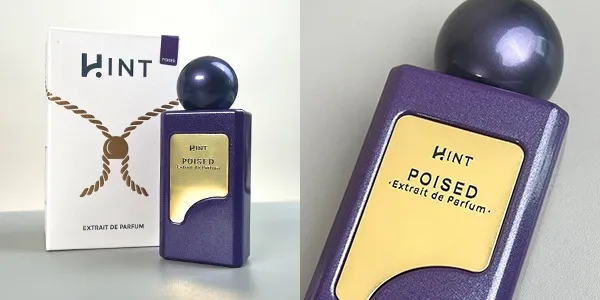 Botol parfum HINT EDP Poised dengan kemasan ungu dan detail gold