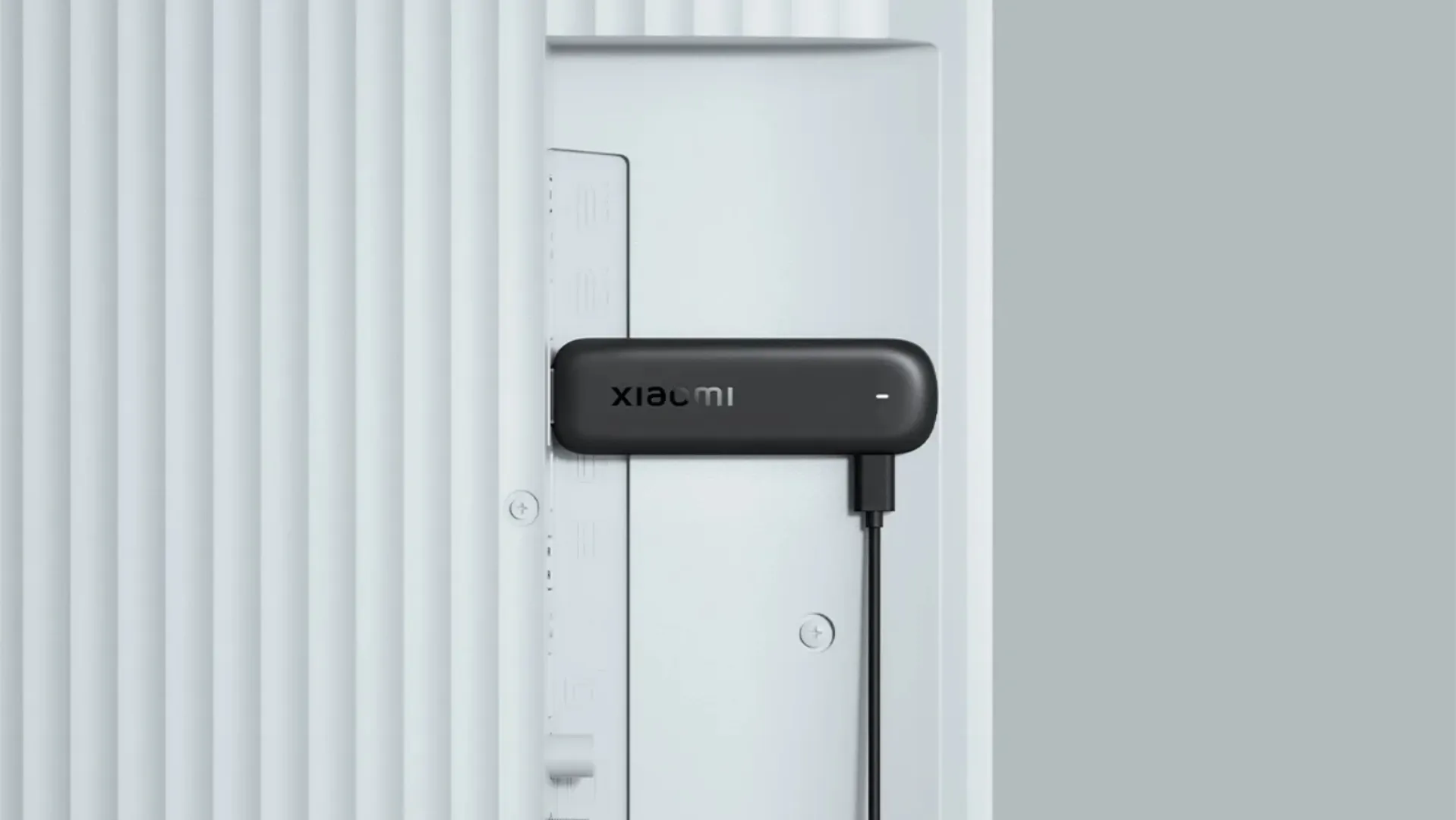 Xiaomi TV Stick HD (2nd Gen) dan remote control dengan tombol suara